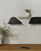 Black and white metal wall shelves with hooks for keys and small items