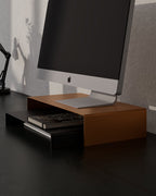 Black metal monitor stand with lower shelf for keyboard notebook or desk items storage