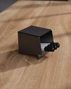 Black pen holder with pens
