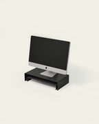 Black metal monitor stand with lower shelf for keyboard notebook or desk items storage
