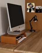 Orange metal monitor stand with lower shelf for keyboard notebook or desk items storage