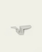White metal nightstand on light background