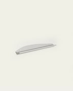 White slim metal wall shelf on light background