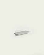 White slim metal wall shelf 30 cm on light background